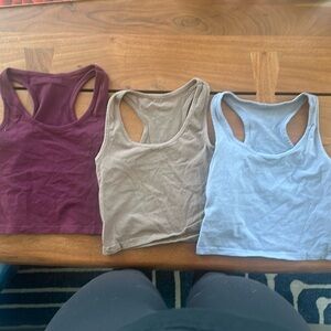 Three tank tops